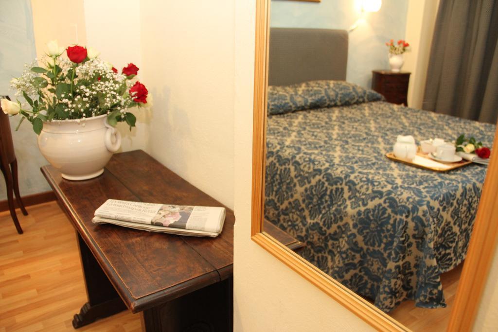 Gemini Camere E Suites Grosseto Oda fotoğraf