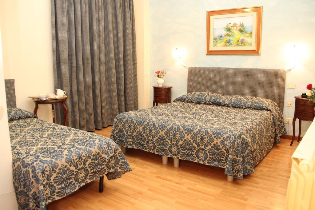Gemini Camere E Suites Grosseto Oda fotoğraf